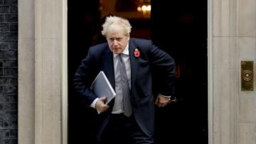 UK's Johnson in quarantine but declares himself fit, working