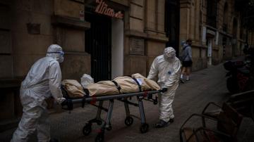 Spain’s mortuary workers endure the daily march of death