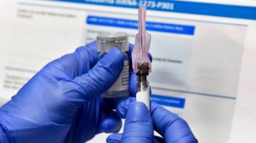 US awaits word on 2nd vaccine as COVID-19 outbreak worsens