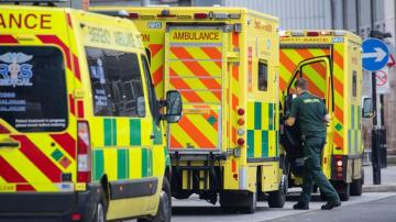 UK hospitals struggle; tougher rules eyed to fight variant