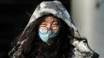 Asia Today: Virus cluster brings new measures for China city