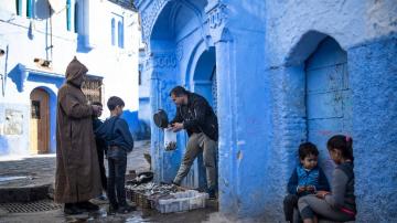 AP PHOTOS: Pandemic empties blue-hued Moroccan tourist town