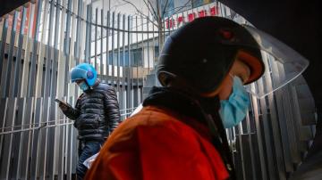 Asia Today: Virus restrictions heightened in China province