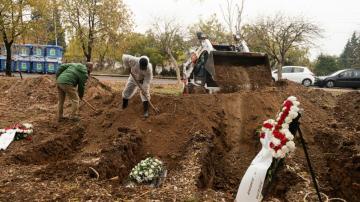 In Greek city, segregated graves extend COVID-19 isolation
