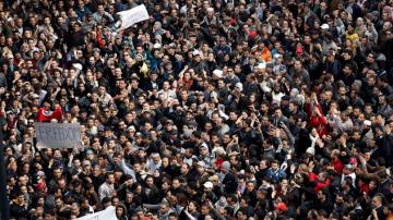 Somber Tunisia marks 10 years since revolution in lockdown