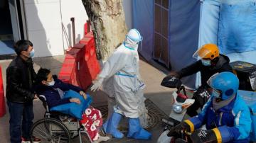 China builds new quarantine center as virus cases rise
