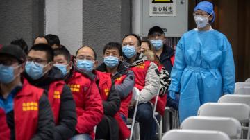 China builds hospital in 5 days after surge in virus cases