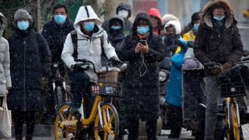 Asia Today: China sees virus outbreaks across its northeast
