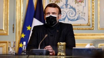 The Latest: French leader promotes vaccine efforts for poor