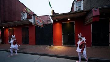 Muted Mardi Gras: Closed bars, barricaded Bourbon Street