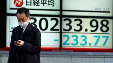 Asian shares slip on profit-taking, hopes grow for recovery