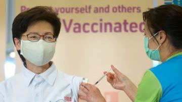 Hong Kong leader, other officials receive COVID-19 vaccine