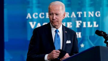 Biden boosts US vaccine stockpile as world waits