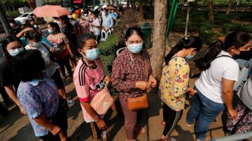 The Latest: Philippine pandemic spokesman says he's infected
