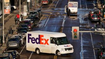 FedEx's profit nearly triples as online shopping grows
