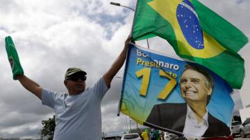 Bolsonaro under fire as Brazil hits 300,000 virus deaths