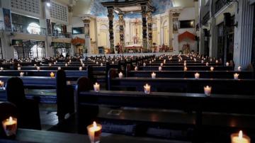 The Latest: No crowds at Holy Week ceremonies amid pandemic