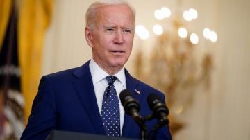 AP sources: Biden to pledge halving greenhouse gases by 2030