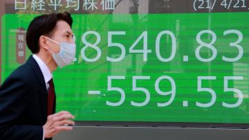 Asian shares slide as virus casts shadow over recovery