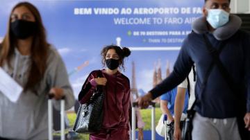 Vacation redux: British tourists return to Portugal beaches