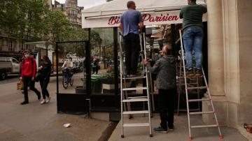 Grand day for the French: Cafe and bistro terraces reopen