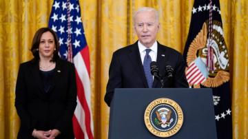 Biden directs US to mitigate financial risk from climate