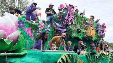 Alabama city throws 'Tardy Gras' parade as pandemic ebbs
