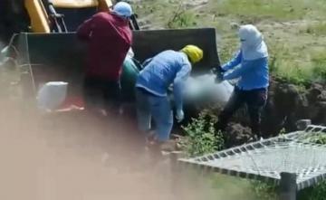 Excavator Used By Family To Carry, Dump UP Covid Vicitm's Body In Grave