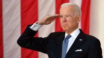 Biden says democracy 'in peril' in speech honoring fallen troops