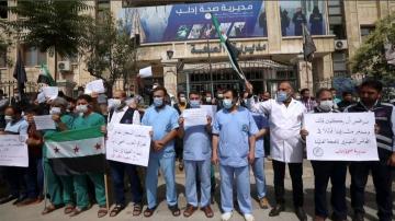 Protesters slam choice of Syria for board of UN health body