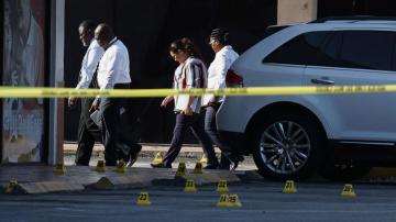 3rd victim dies from Miami mass shooting, gunmen still at large