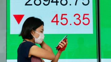 Asian shares advance despite weaker factory data, outbreaks