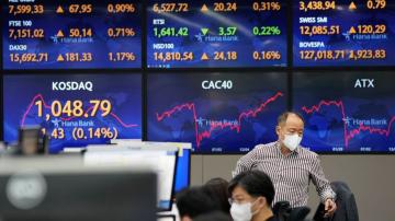 Asian stocks fall after Fed discusses cut in US stimulus