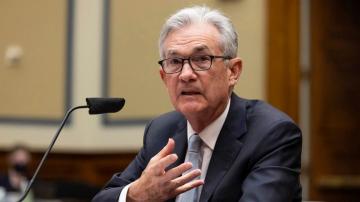 Powell says inflation, though elevated, will likely moderate