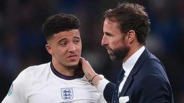 Jadon Sancho: England forward says 'hate will never win' in response to racist abuse