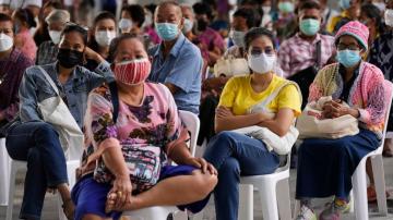 Thailand tightens measures as daily cases cross 10,000
