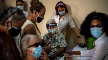 Virus slams Cuba as it races to roll out its new vaccines