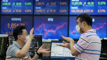 Asian markets mixed after modest gains on Wall St