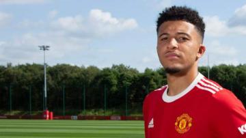 Jadon Sancho: England winger completes £73m move to Manchester United from Borussia Dortmund