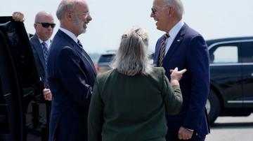 At Mack plant, Biden checks out big rigs, chats up workers