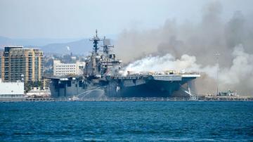 Navy sailor charged with setting blaze that destroyed billion-dollar ship last year