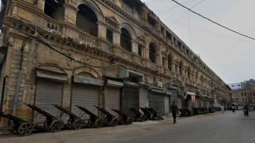 The Latest: Pakistan locks down Karachi amid new surge