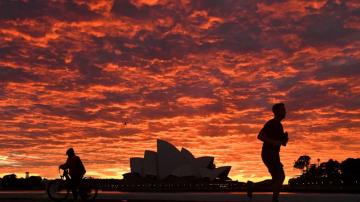 The Latest: Qantas furloughs 2,500 staff amid lockdown
