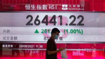 Asian stocks follow Wall Street up as virus curbs tightened