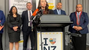 New Zealand plans to start reopening borders early next year