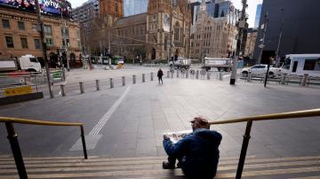 The Latest: Australian capital locks down after 1 infection