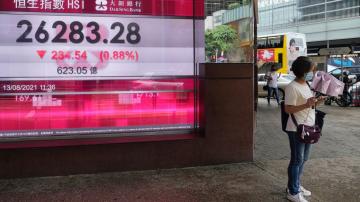 Asian stocks slip with eye on economic releases