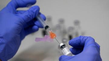 The Latest: Sources: US to recommend vaccine boosters