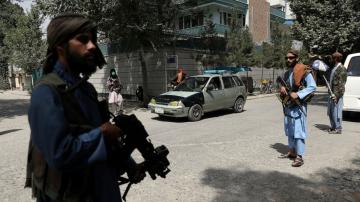 Taliban violently disperse rare protest, killing 1 person