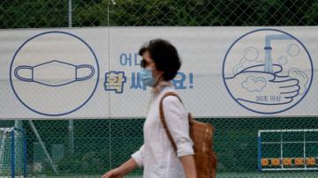 The Latest: Virus rules in Seoul extended another month